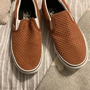 Vans size 7 Women’s (5.5 mens) like new condition. Has a unique raised design.